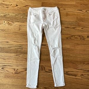 Pink distressed AE jeans